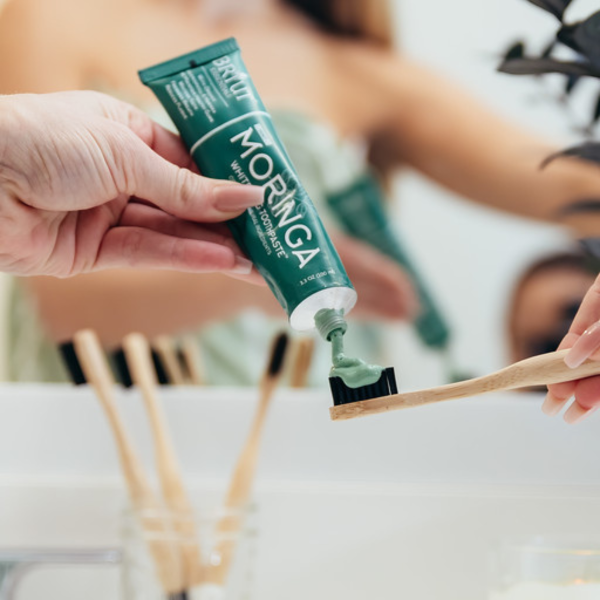 moringa2 moringa natural toothpaste on toothbrush